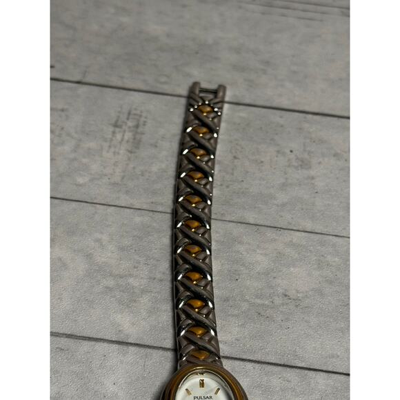 Pulsar Women V811-X043 White Dial Two-Tone Band 17mm Oval Quartz Watch - Picture 4 of 7